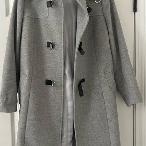 Purchased in Spain. Removable hood